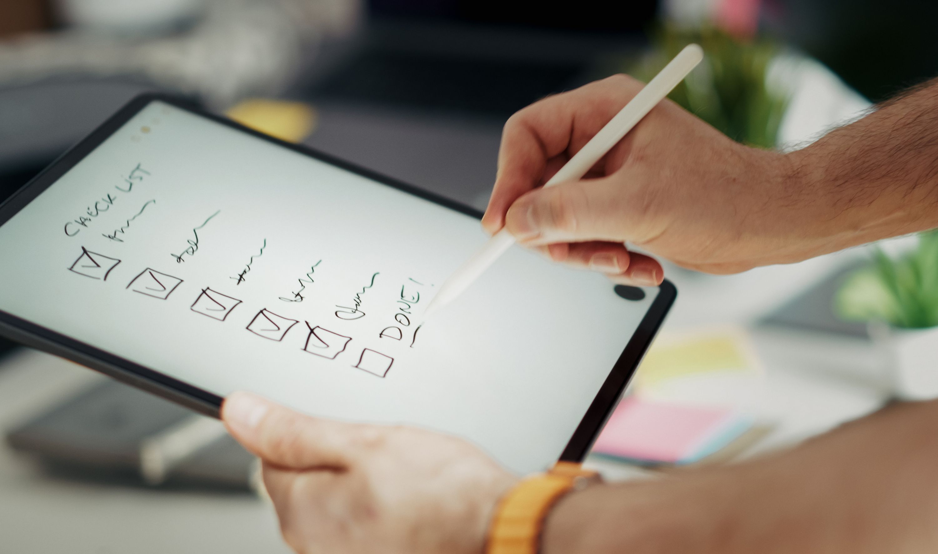 A founder checking off build steps on a digital checklist